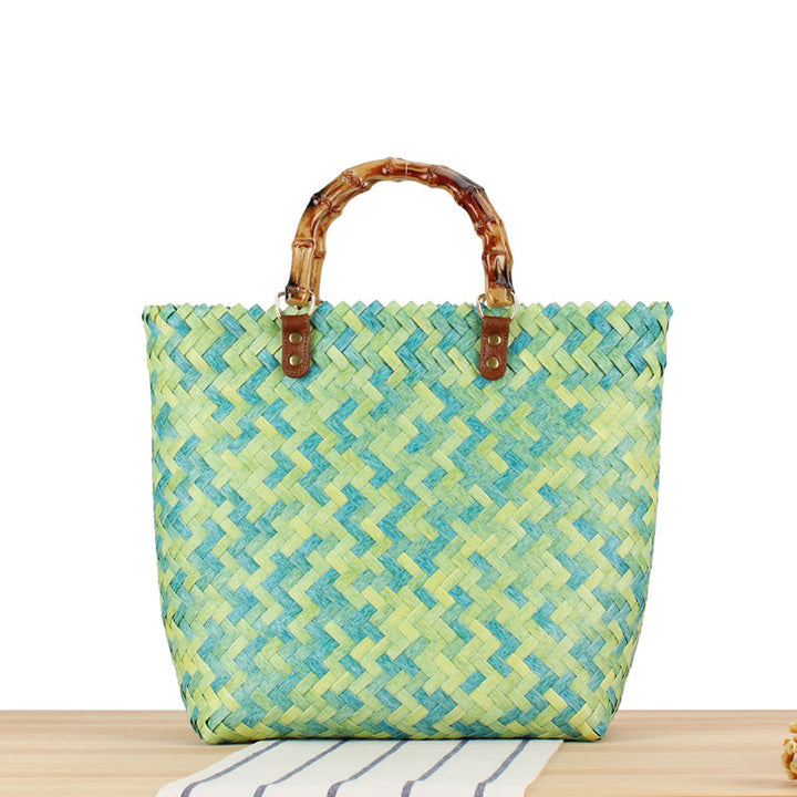 Handbag made of high-quality, braided material with bamboo handle Skanto
