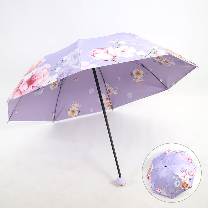 Kvinnes elegant sammenleggbare paraply med blomsterdesign Skanto