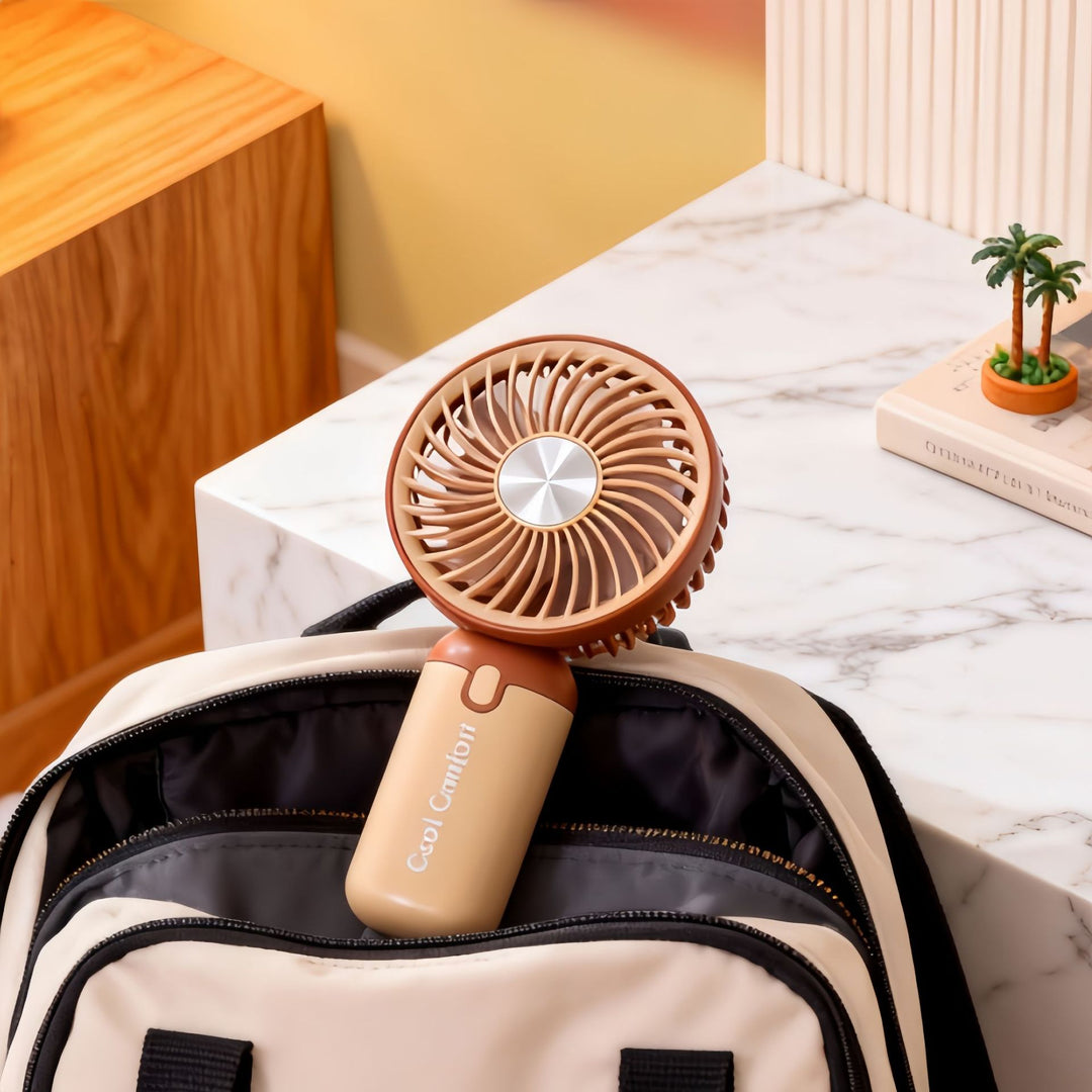 Dame bærbar vifte med trådløs funksjon og ergonomisk design Skanto