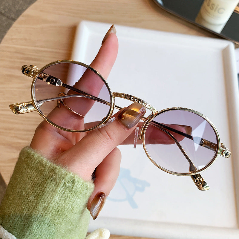Dame Elegant solbrille med filigran detaljer Skanto