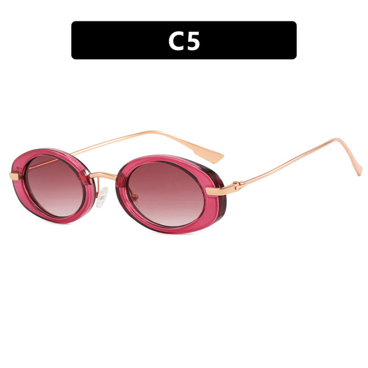 Dame moteriktig solbrille i elegant ovalt design Skanto