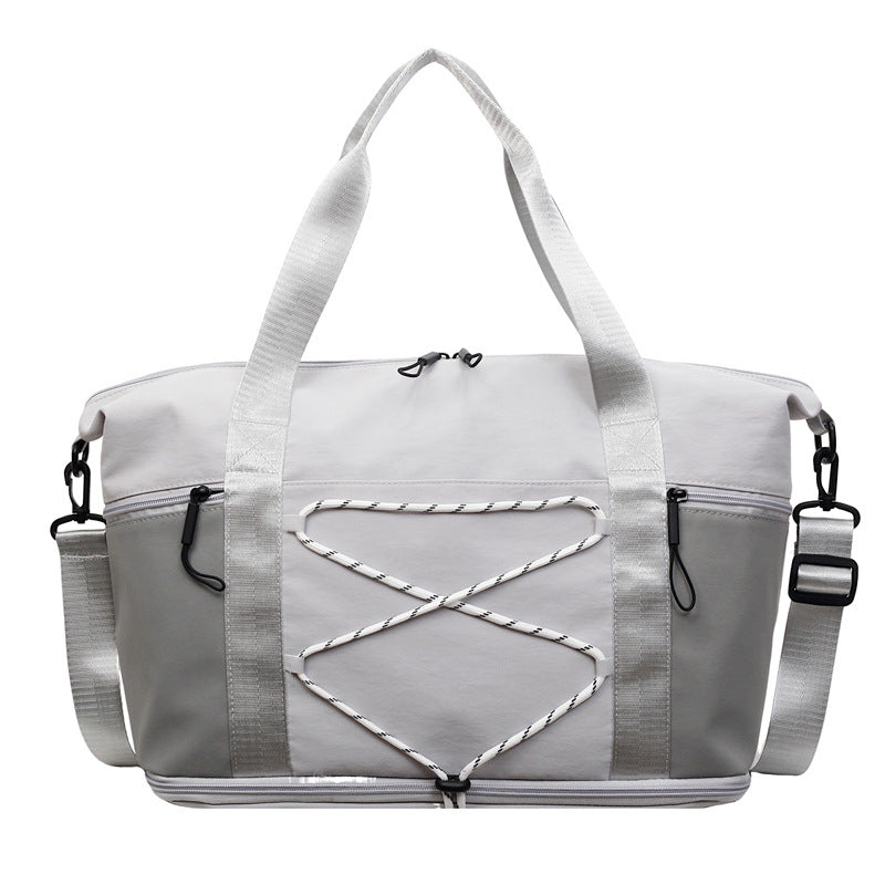 Sporty skulderveske med praktisk organizer Skanto