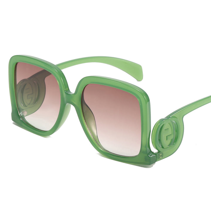 Dame solbrille i elegant kvadrat-design Skanto