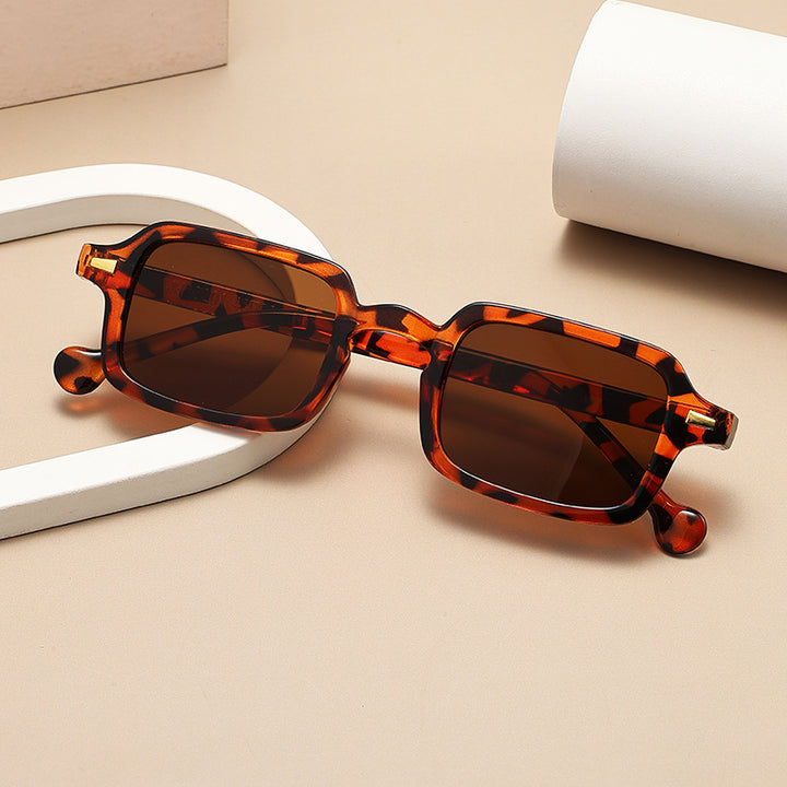 Dame geometrisk solbrille med trendy dyreprint Skanto