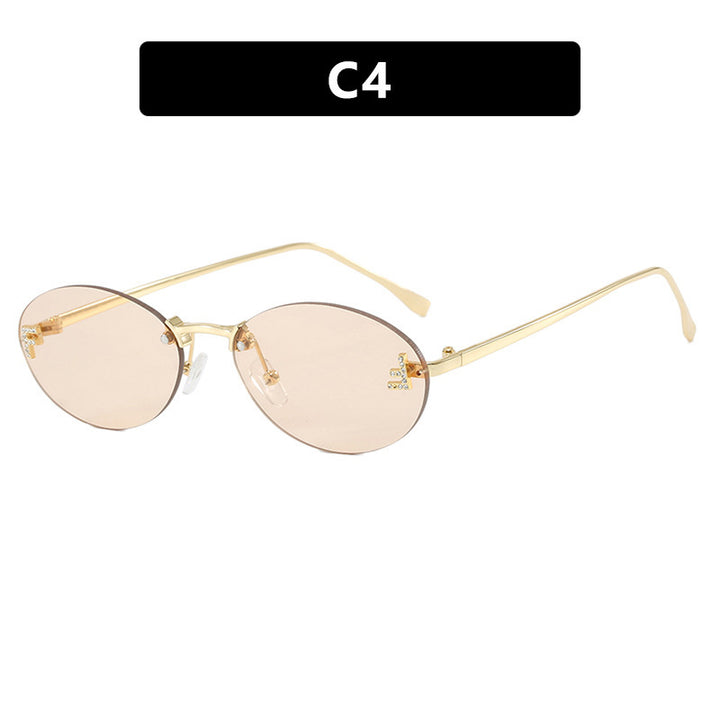 Dame mote trendy solbriller med elegante, runde glass og filigran metallramme Skanto