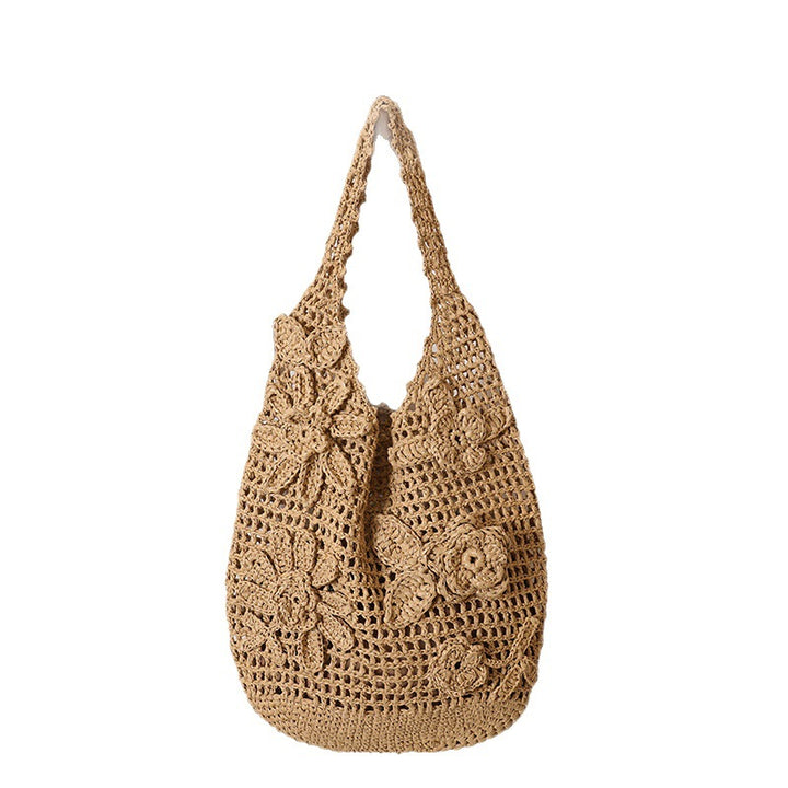 Crocheted shoulder bag with floral appliqués Skanto