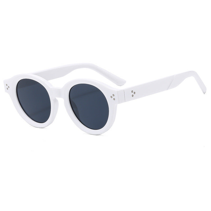 Dame moteriktig solbrille med klar og strukturert ramme Skanto