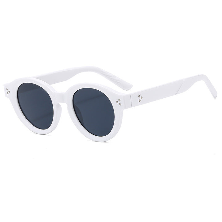 Dame moteriktig solbrille med klar og strukturert ramme Skanto