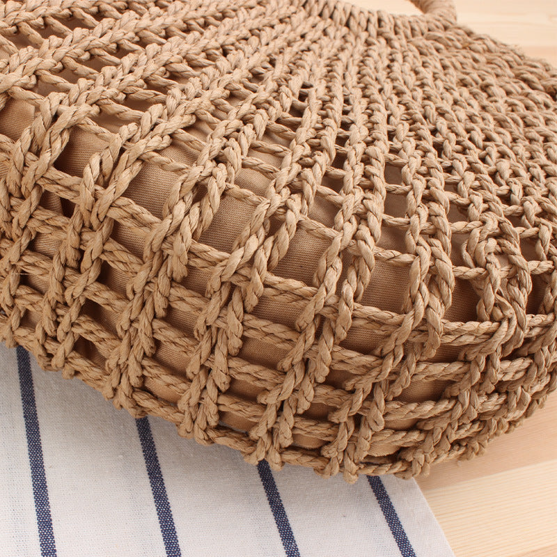 Handbag made of handmade weave with elegant round handle Skanto