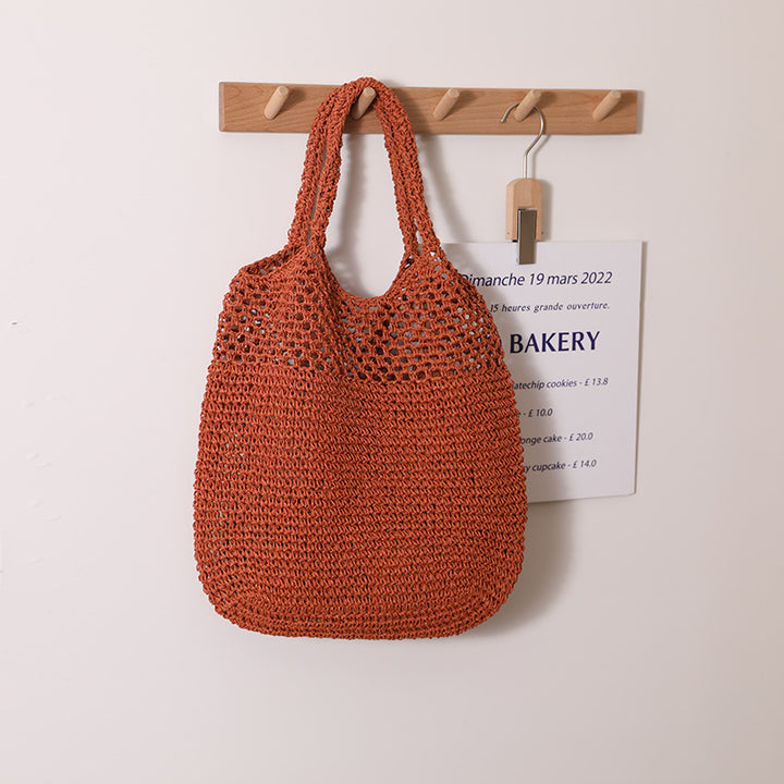 Hand-knotted raffia bag with long carrying handles Skanto