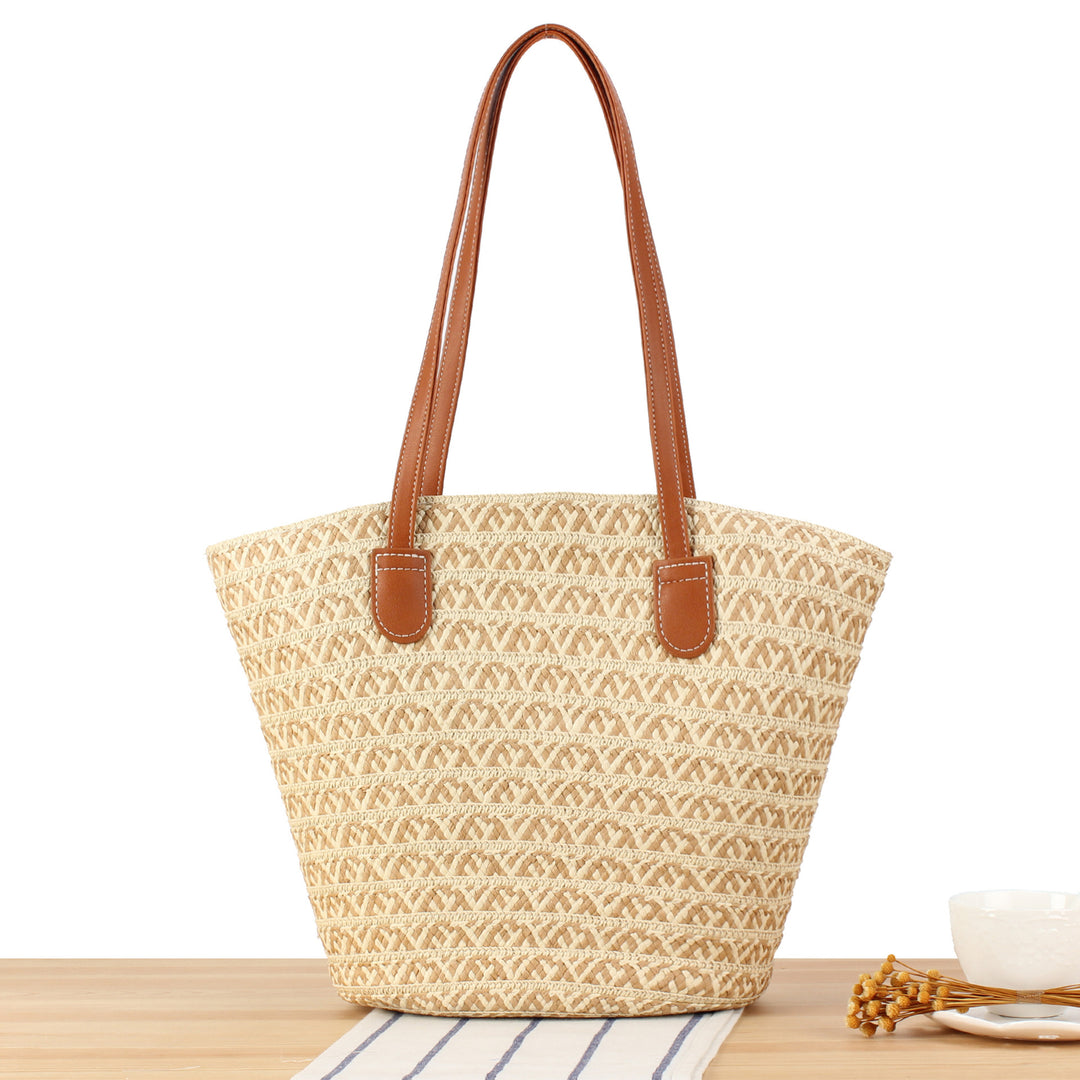 Designer handbag with contrasting pattern and elegant leather handles Skanto