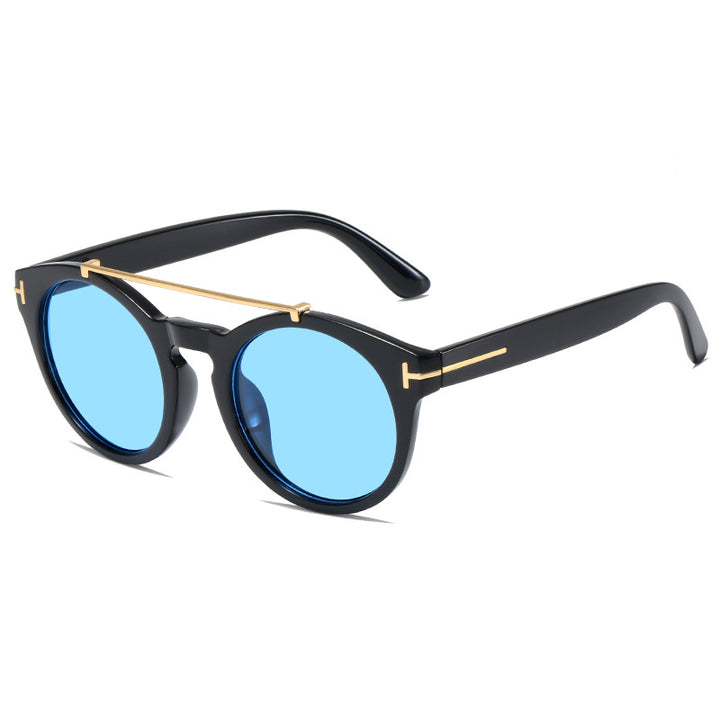 Dame fashionable solbriller med elegante runde glass Skanto