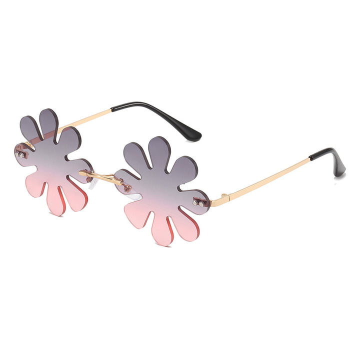 Dame Lekker blomster-solkors med stilfull metallramme Skanto