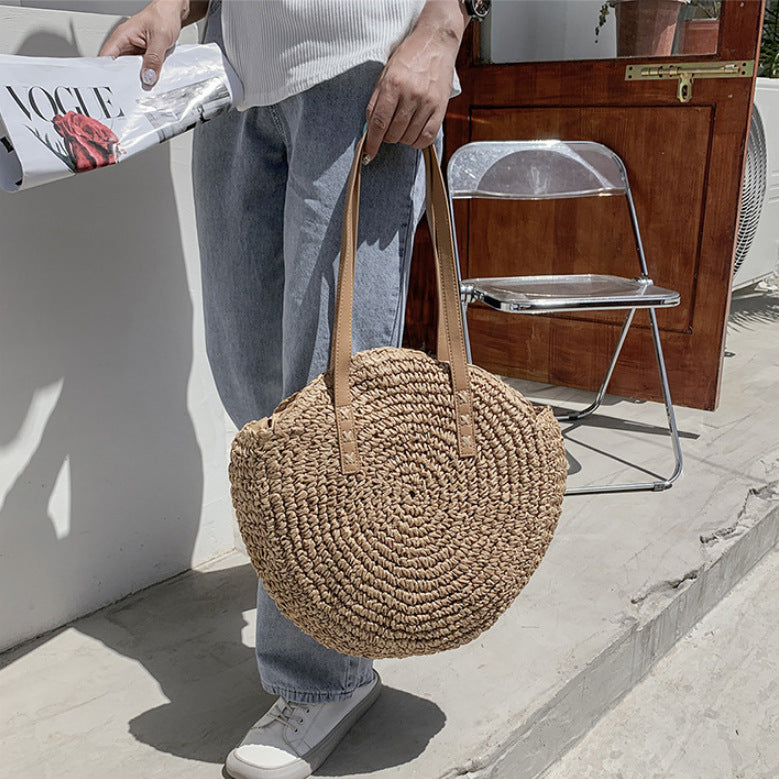 Håndlaget rundstrandbag Skanto
