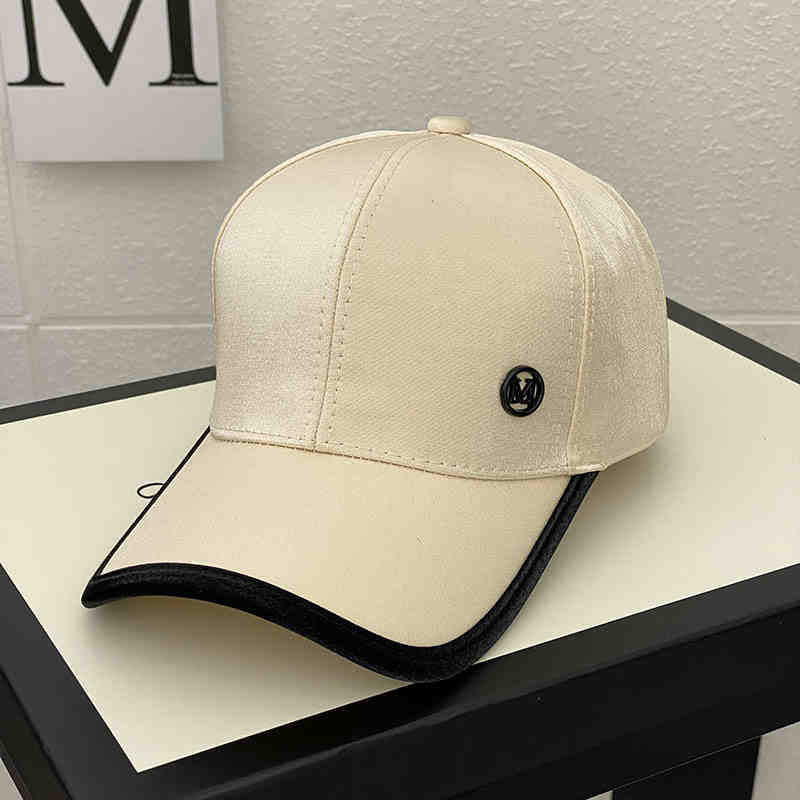 Kvinnenes skinnende sateng baseballcap Skanto