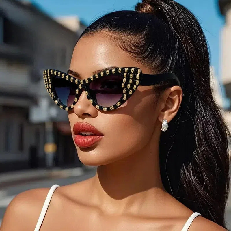 Dame Cat-Eye solbriller med farget akzentuerte ramme Skanto