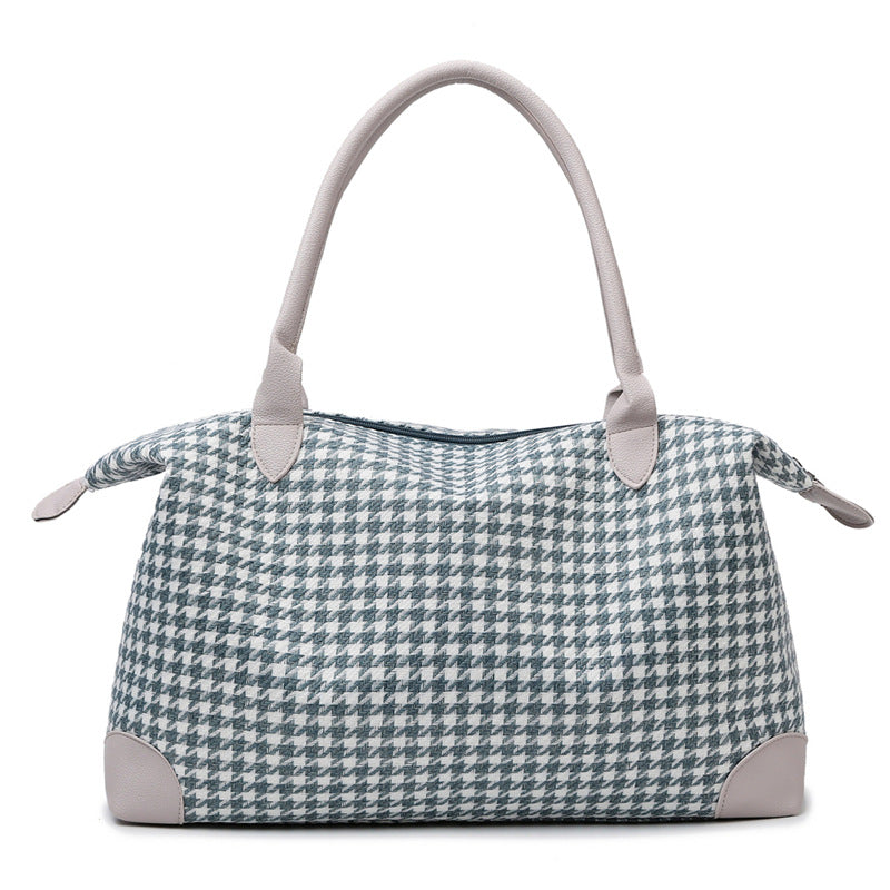 Moderne håndveske i tidløs houndstooth-mønster Skanto