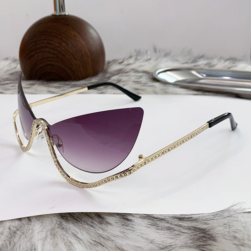 Women's extravagant shaped Cat-Eye sunglasses with sparkling applications Skanto