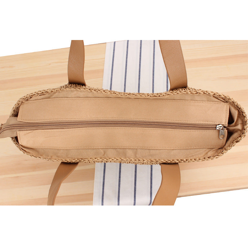 Wide straw bag with elegant leather handles Skanto