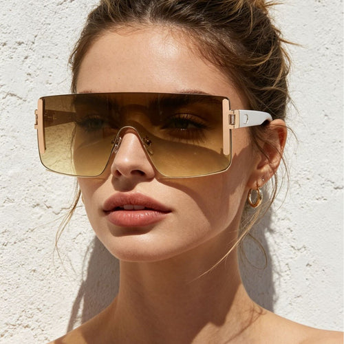 Dame oversized solbrille med moderne futuristisk design Skanto