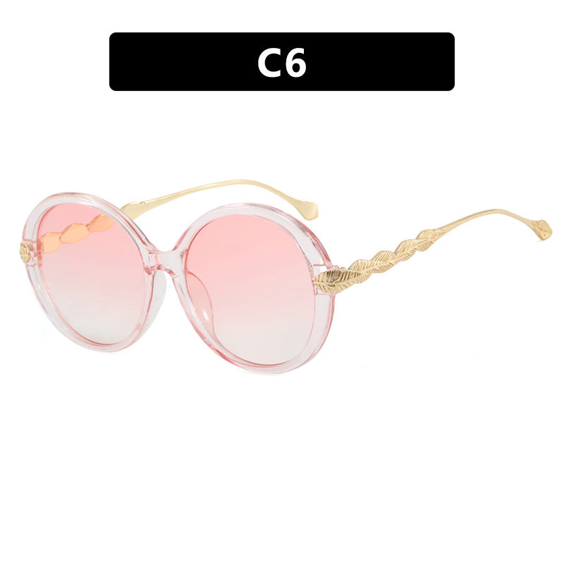 Women's large round sunglasses with decorative metal accents Skanto