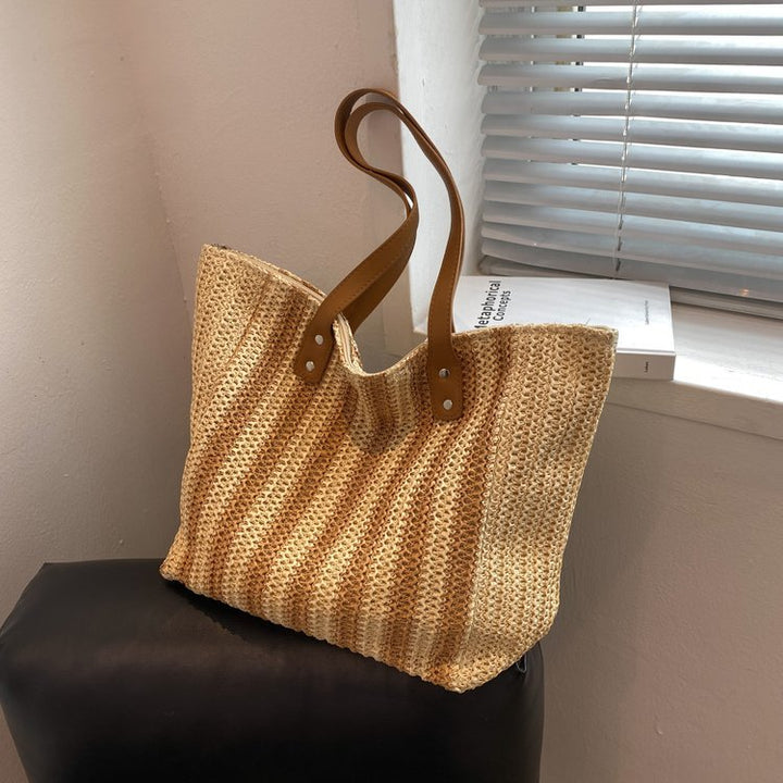 Romslig shopper-veske med skinnakenter Skanto