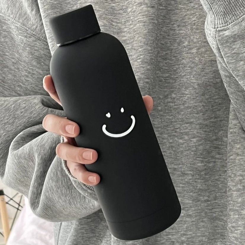 Dame isoleringsflaske med lyst smilendesign Skanto