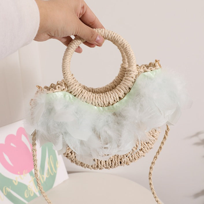 Elegant basket bag with delicate feather details Skanto