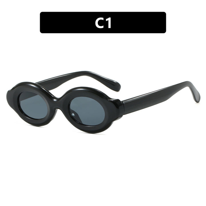 Dame solbrille i trendy retro-design med ovale glass Skanto