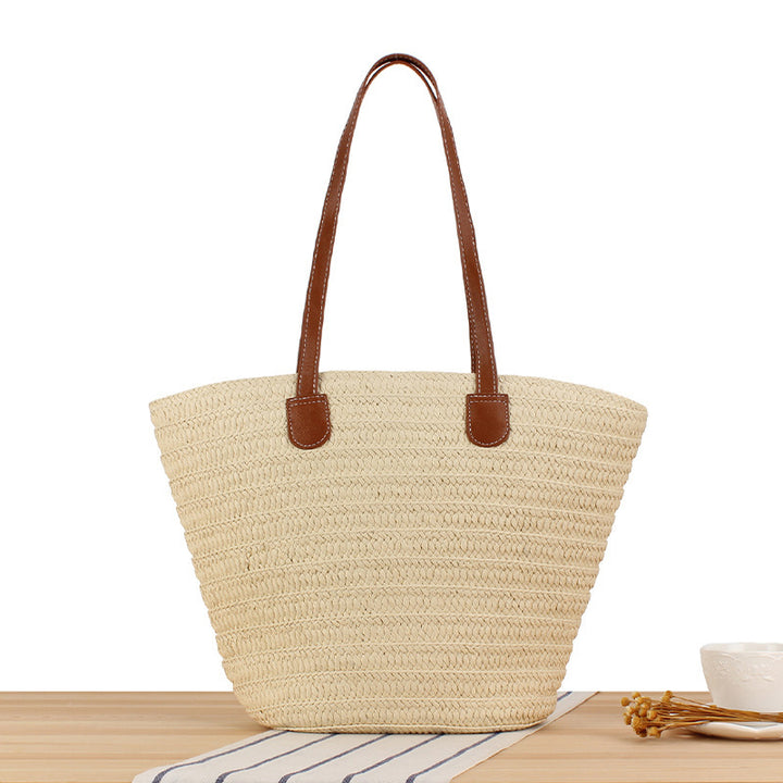 Elegant shoulder bag made of natural raffia with high-quality leather accents Skanto