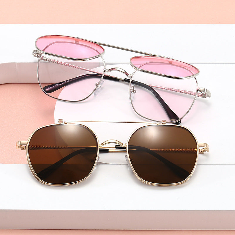 Dame geometrisk oversized solbrille med elegant gullramme Skanto