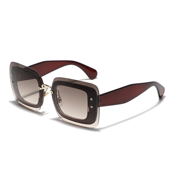 Dame kvadratisk solbrille med innovativ ramme Skanto