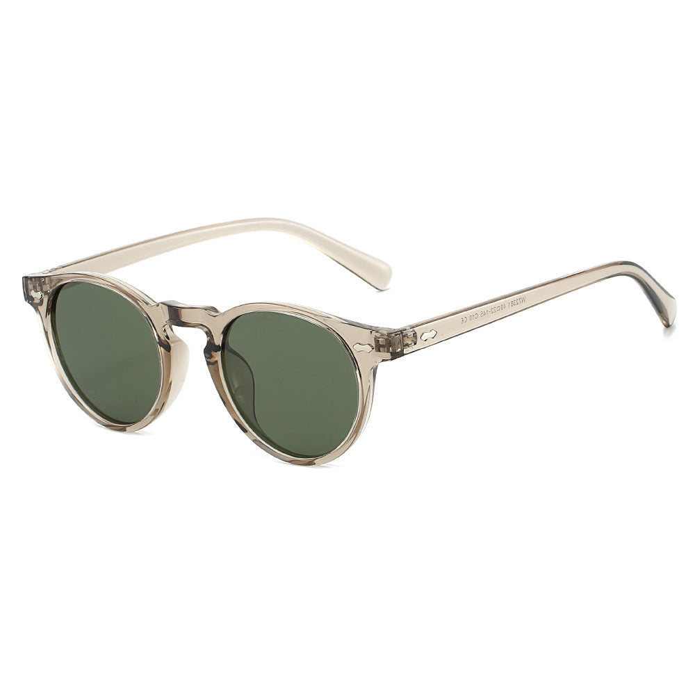 Dame vintage solbriller med runde glass og transparent ramme Skanto