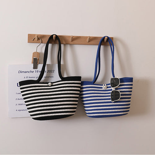 Trendy handbag with stylish stripes Skanto