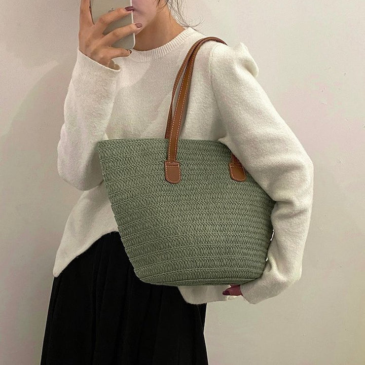 Designer-bag med elegante kunstlærhåndtak Skanto