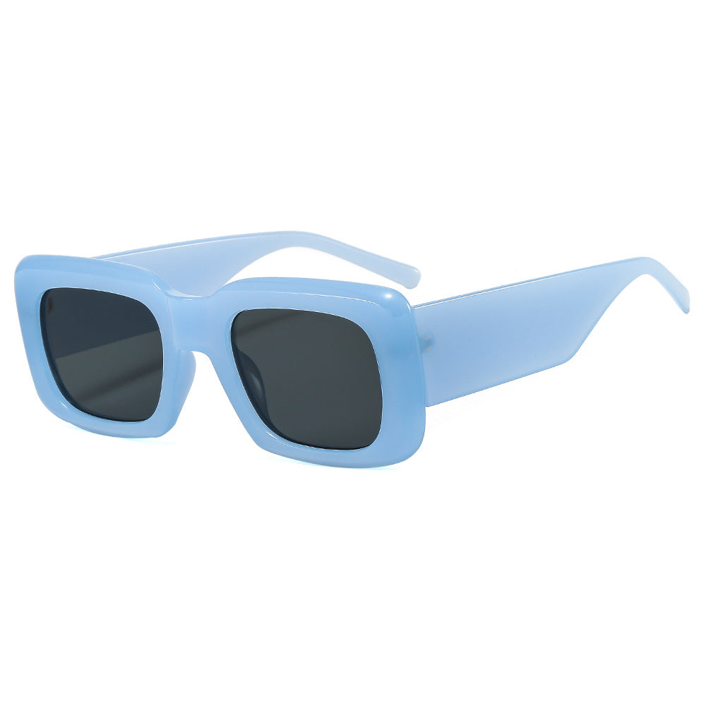 Dame oversized solbriller med kvadratisk ramme og transparent design Skanto