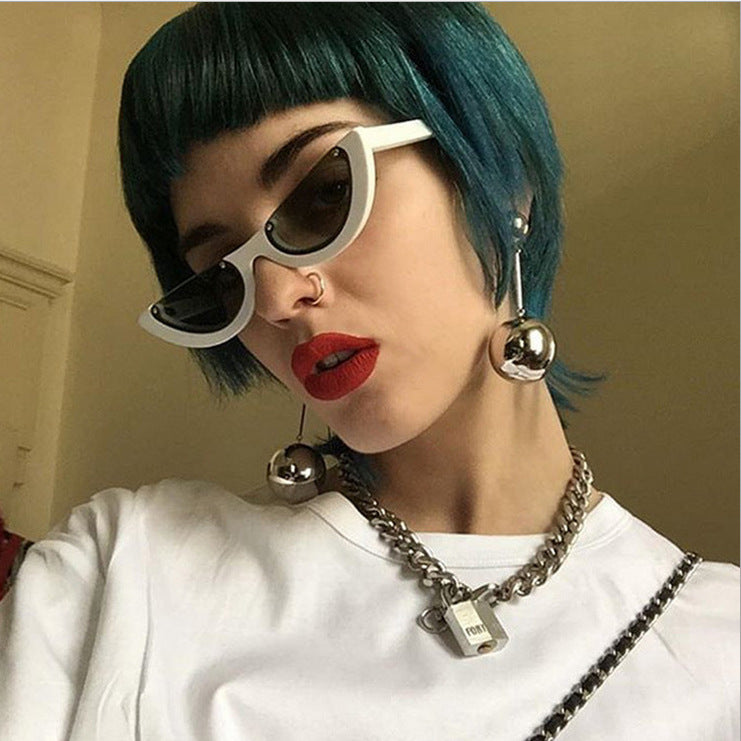Dame Cat-Eye Briller med markant ramme og speilbelagte glass Skanto