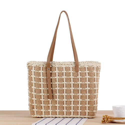 Hand-knotted tote bag in natural material with elegant leather handles Skanto