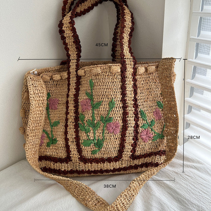 Flettet skulderveske med blomsterdesign Skanto