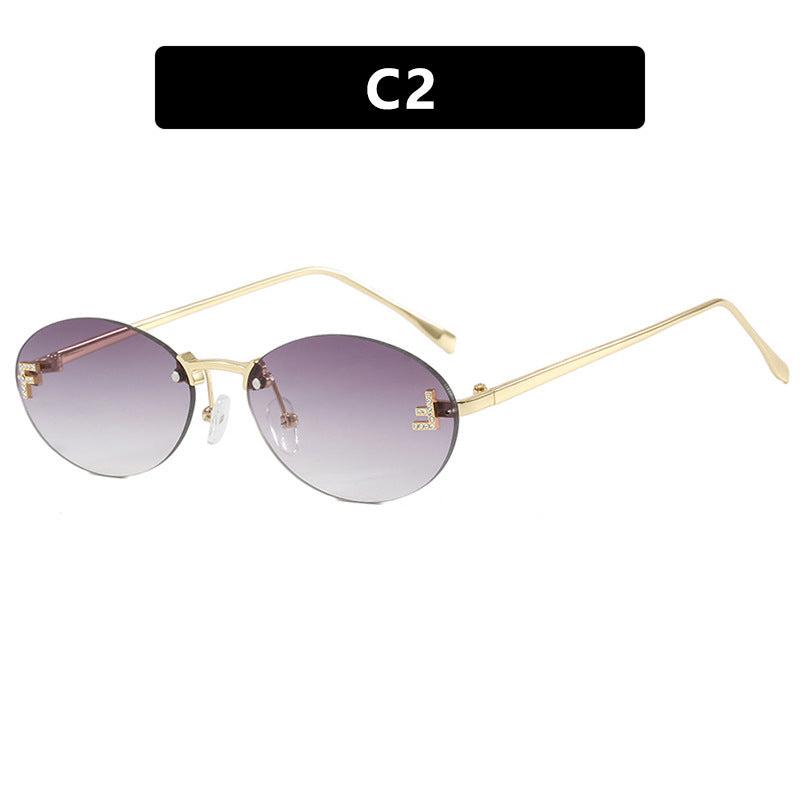 Dame mote trendy solbriller med elegante, runde glass og filigran metallramme Skanto