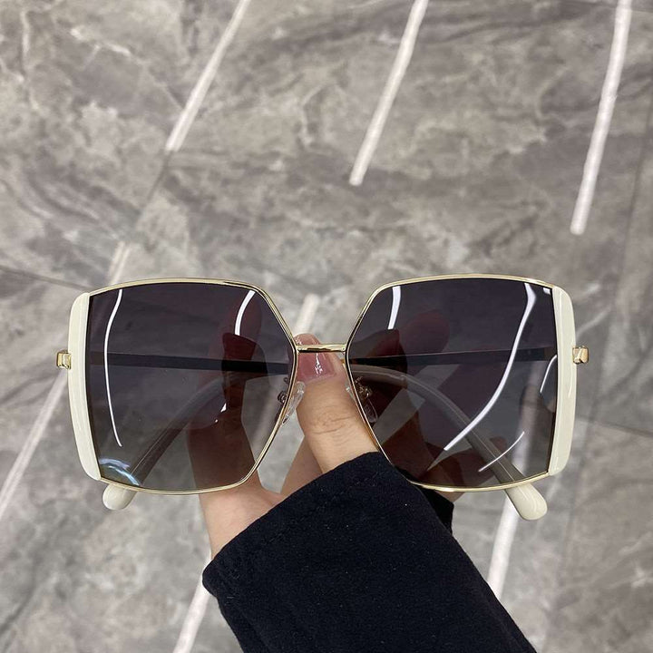 Dame oversized solbriller med glamorøs ramme Skanto