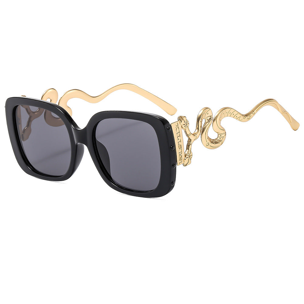 Dame ekstravagant designer solbrille med luksuriøs slangeramme Skanto