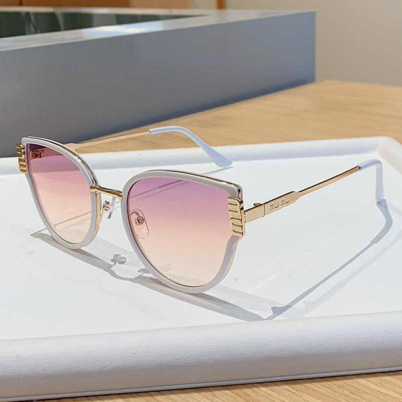 Damer Cat-Eye solbriller med elegante fremhevede linser Skanto
