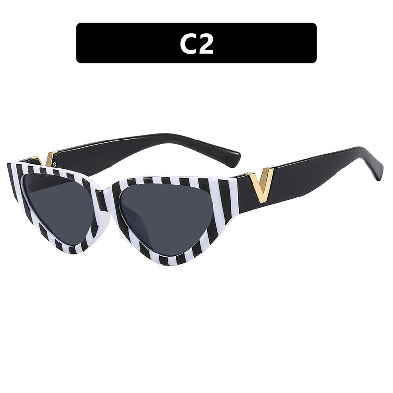 Women's Cat-Eye Sunglasses with Stylish Zebra Design and Luxurious Accents Skanto
