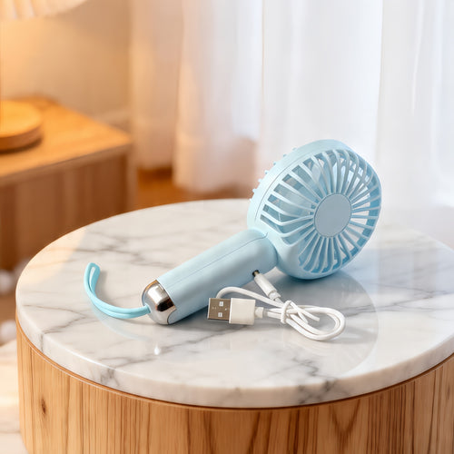 Kvinnelig bærbar håndholdt vifte med USB-ladefunksjon og ergonomisk design Skanto
