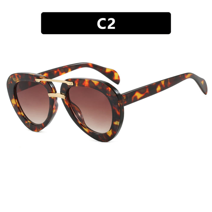 Women's extravagant sunglasses in modern heart design Skanto
