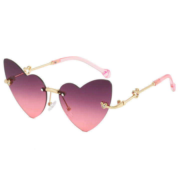 Damer hjerteformet solbrille med dekorert ramme Skanto