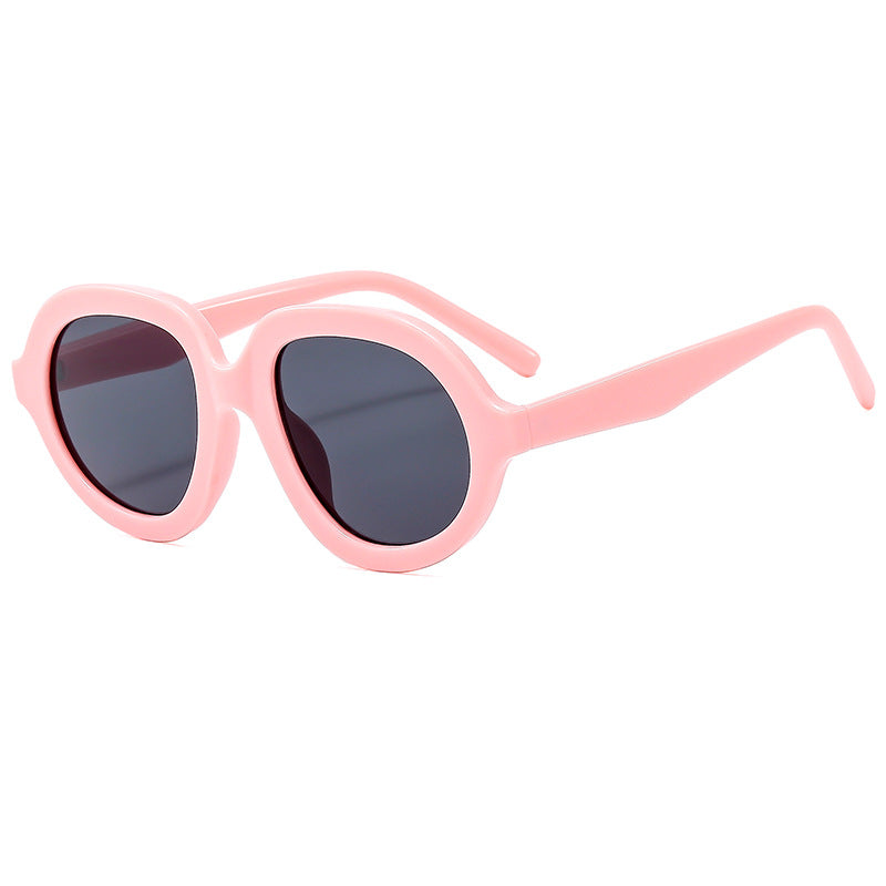 Dame trendy solbriller med bred, oval ramme Skanto