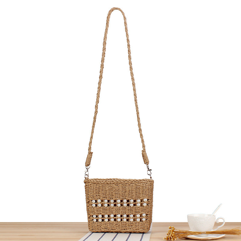 Handbag made of hand-woven natural material with bead decoration Skanto
