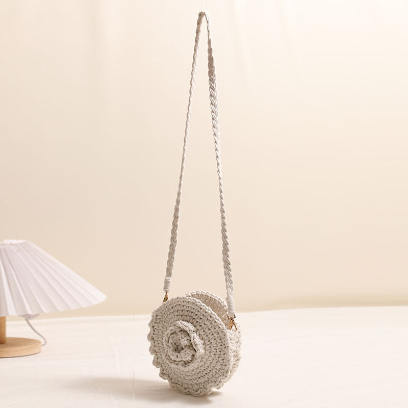 Hand-crocheted crossover bag with floral details Skanto